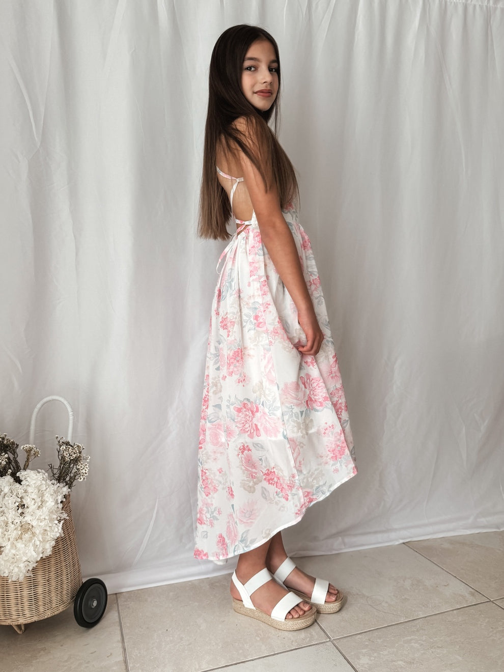Side angle of the high-low hem on the Lola Pink Dream Dress.
