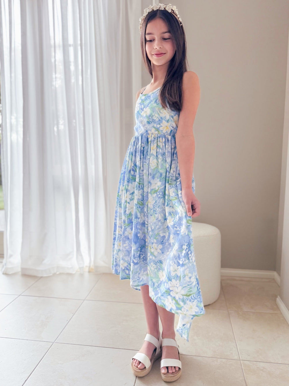 Bluebelle dress flowing mid-twirl in a summer lighitng