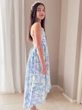 Light blue floral high-low dress showing movement from side angle