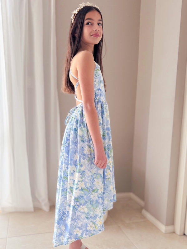 Light blue floral high-low dress showing movement from side angle