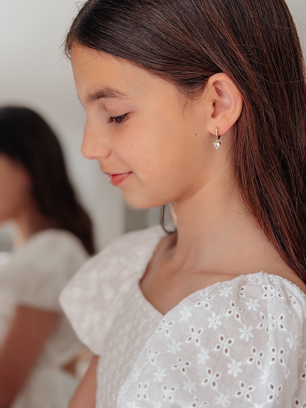 Side view of Love Heart Girls Gold Hoop Earrings – dainty hoops for girls