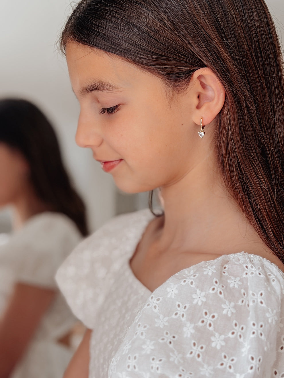 Side view of Love Heart Girls Gold Hoop Earrings – dainty hoops for girls