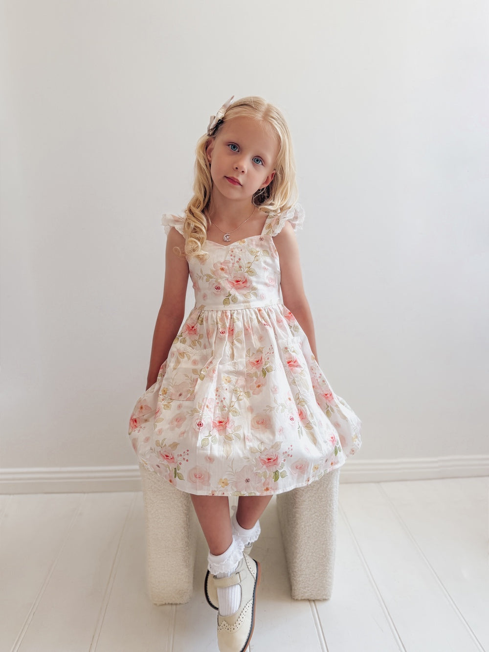 Lucinda Girls Floral Dress with pink and green print and lace trim sleeves