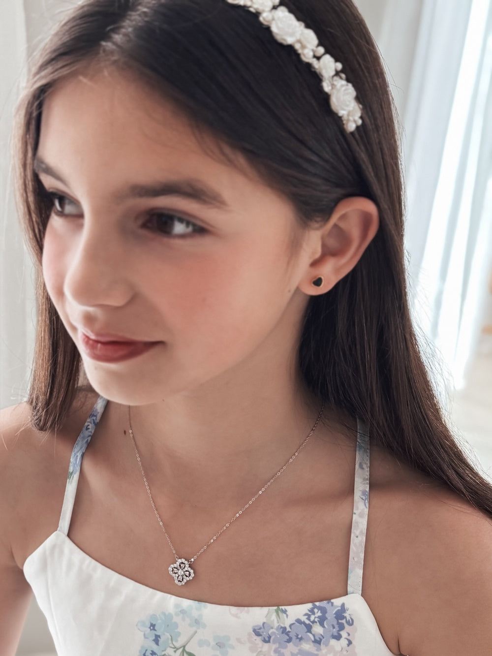 Sterling silver girls necklace featuring lucky clover charm