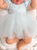 Lila dusty blue baby dress, floral bodice and skirt detail.
