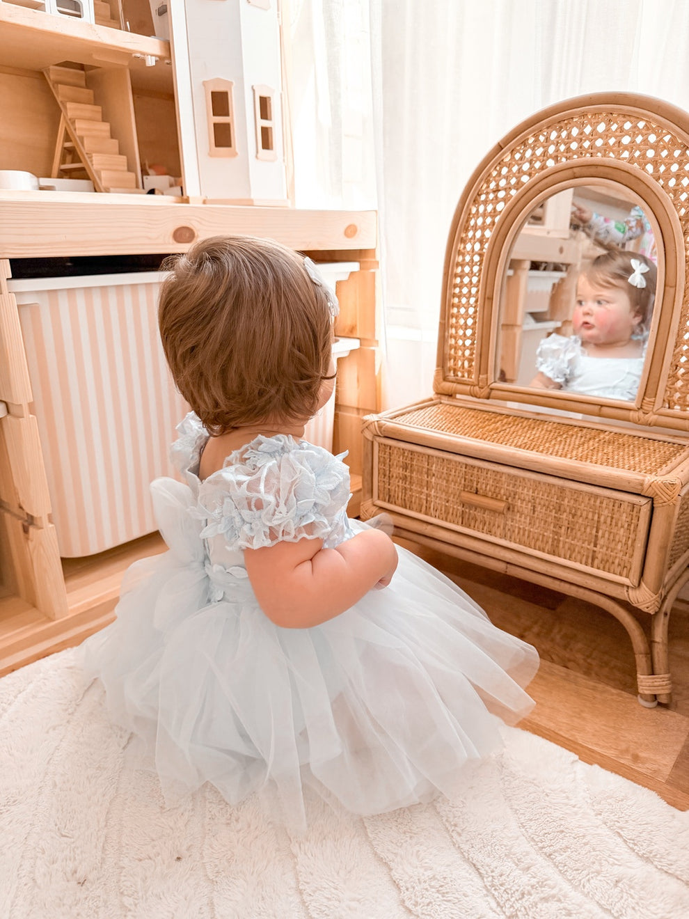 Lila dusty blue tulle baby dress, rear view.