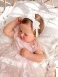 Girls white bow accessory for special occasions