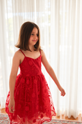 Lucia red embroidered girls Christmas dress, front view and scalloped hem.
