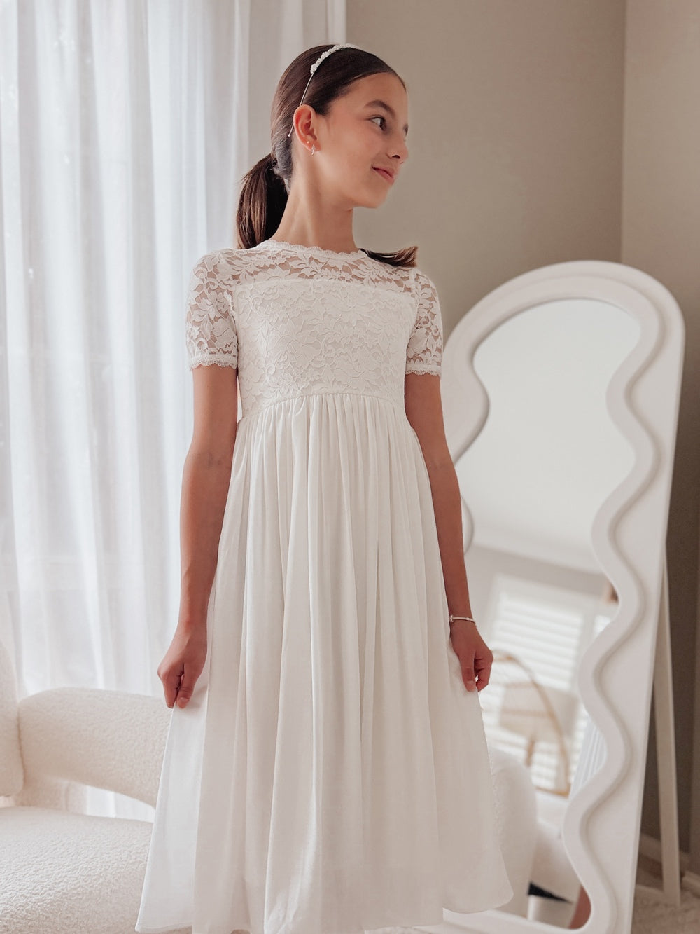 Girls white communion dress with short sleeves and full length skirt