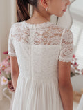 White lace flower girl dress with soft tulle skirt