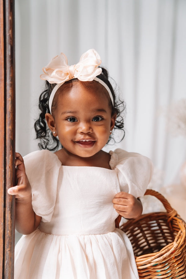 Baby champagne flower girl dress with puff sleeves