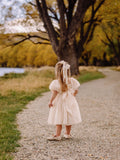 Girls midi length dress in soft champagne