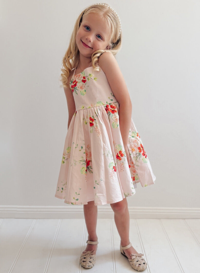 Marley Girls pink floral festive dress styled with sparkly headband