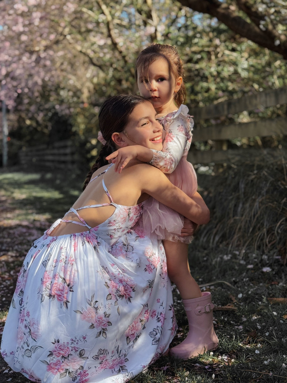 Girls graduation dress floral version from rear with dress silhouette