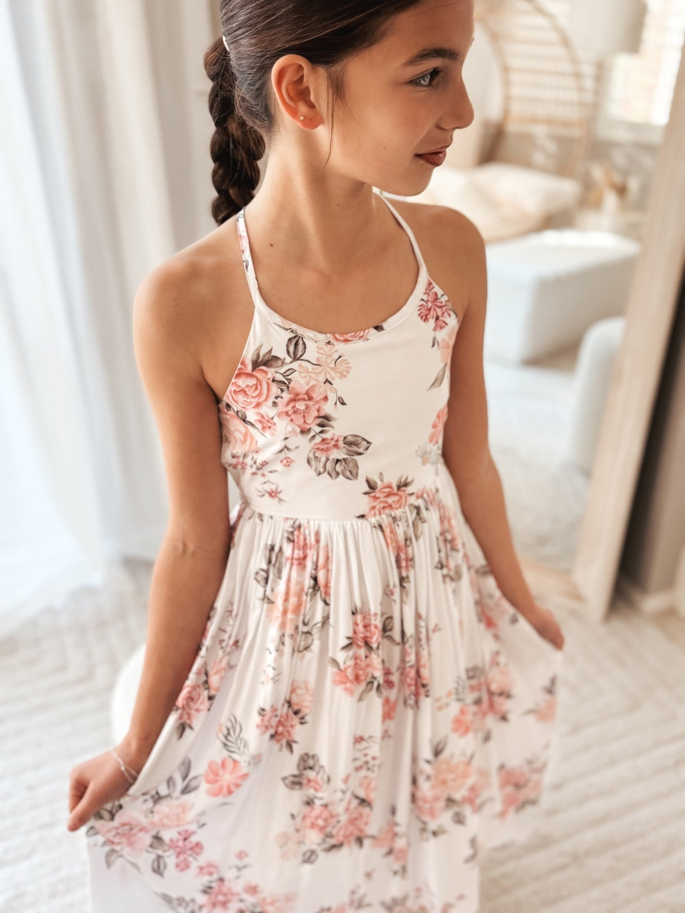 Girls floral high‑low dress with pink and black blooms full front view