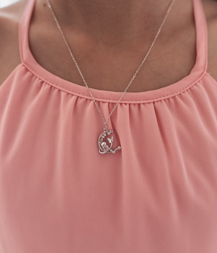 Moonbeam Sparkle Girls Silver Necklace - Girls and Babies JewelleryGirls silver necklace with crescent moon, butterflies, and pink gemstone