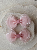 Set of two dusty pink bow hair clips