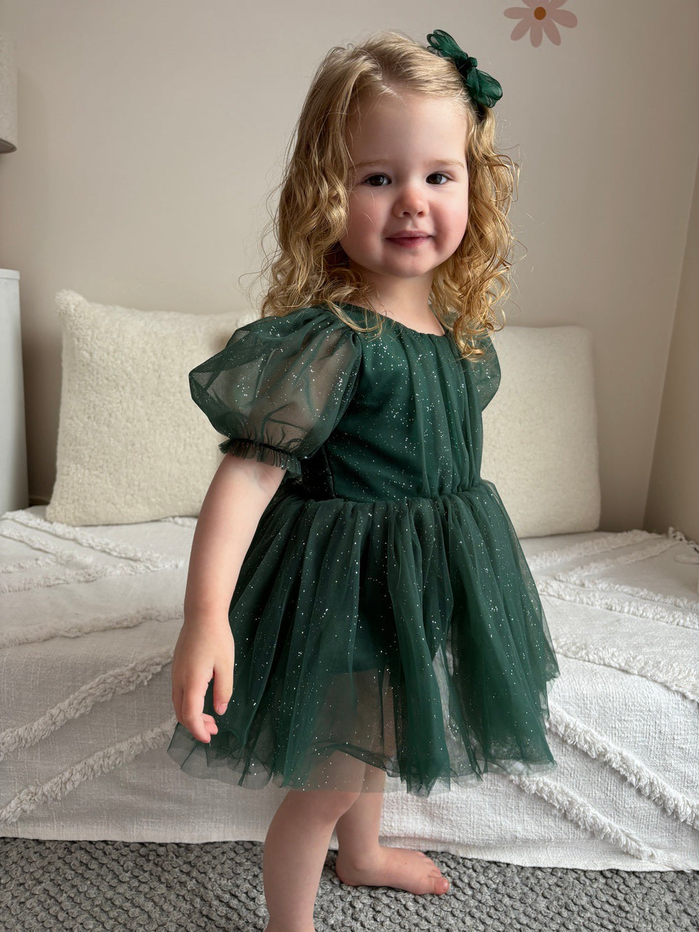 Nina Green Sparkle Romper paired with matching green Christmas bows