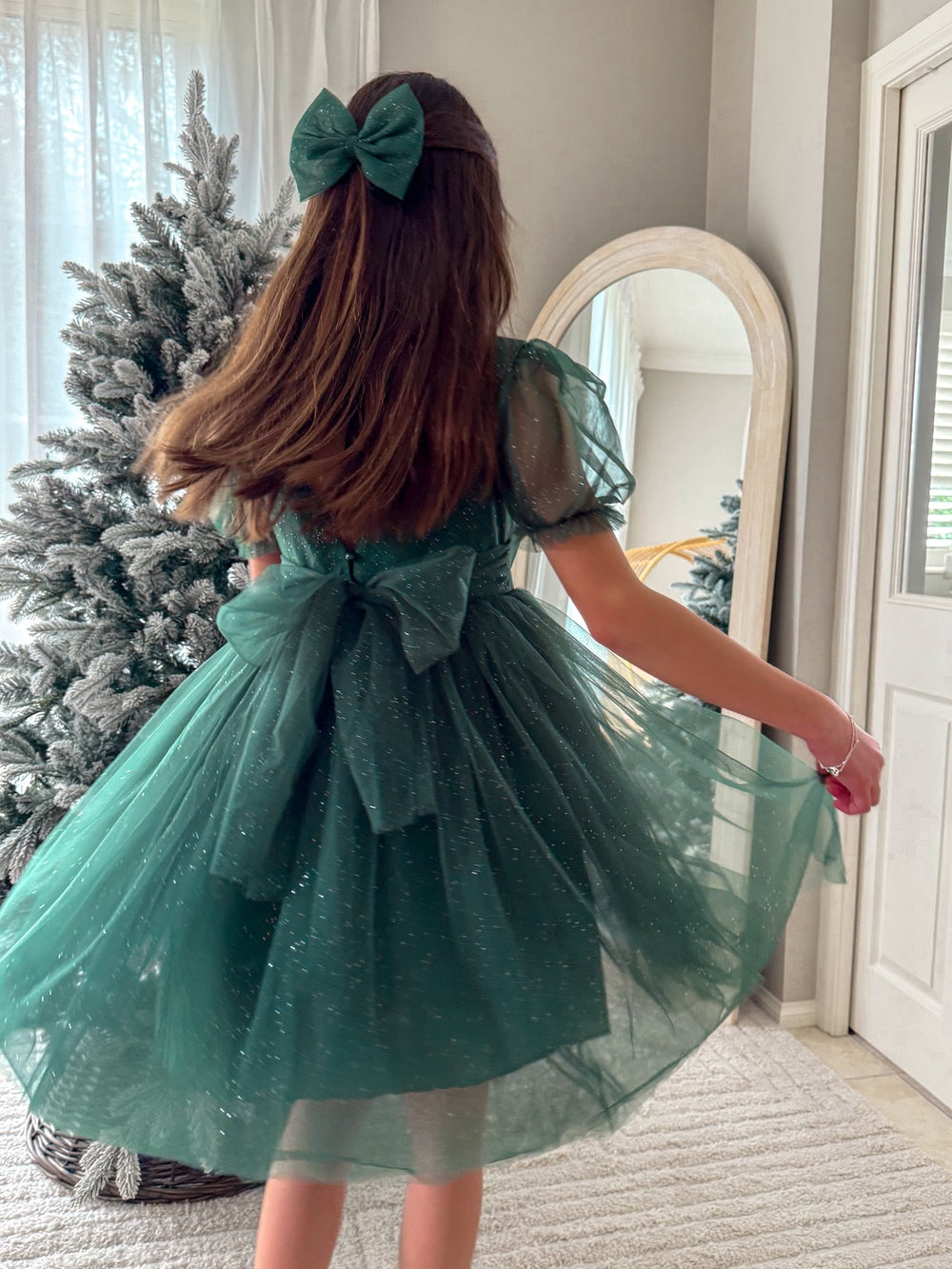 Zip-up back detail and bow on girls shimmering holiday dress