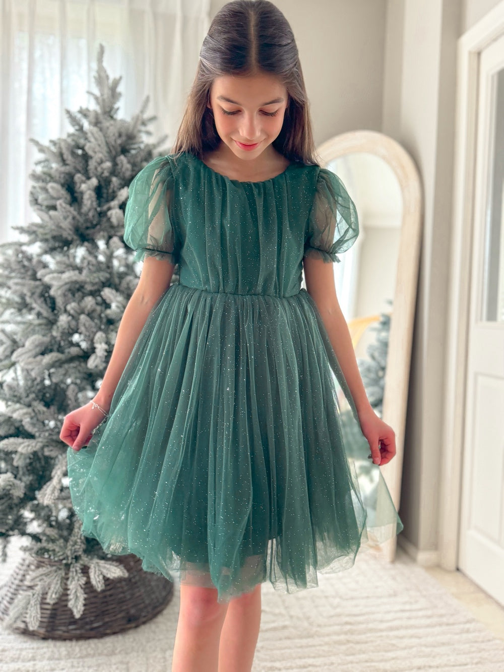 Nina Green Sparkle Girls Christmas Dress - Christmas Dresses and RompersShimmery green girls Christmas dress with puff sleeves and knee-length skirt