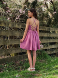 Norah mauve dress with ribbon tie and open lace-up design