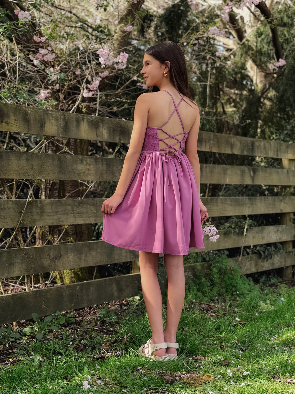 Norah mauve dress with ribbon tie and open lace-up design