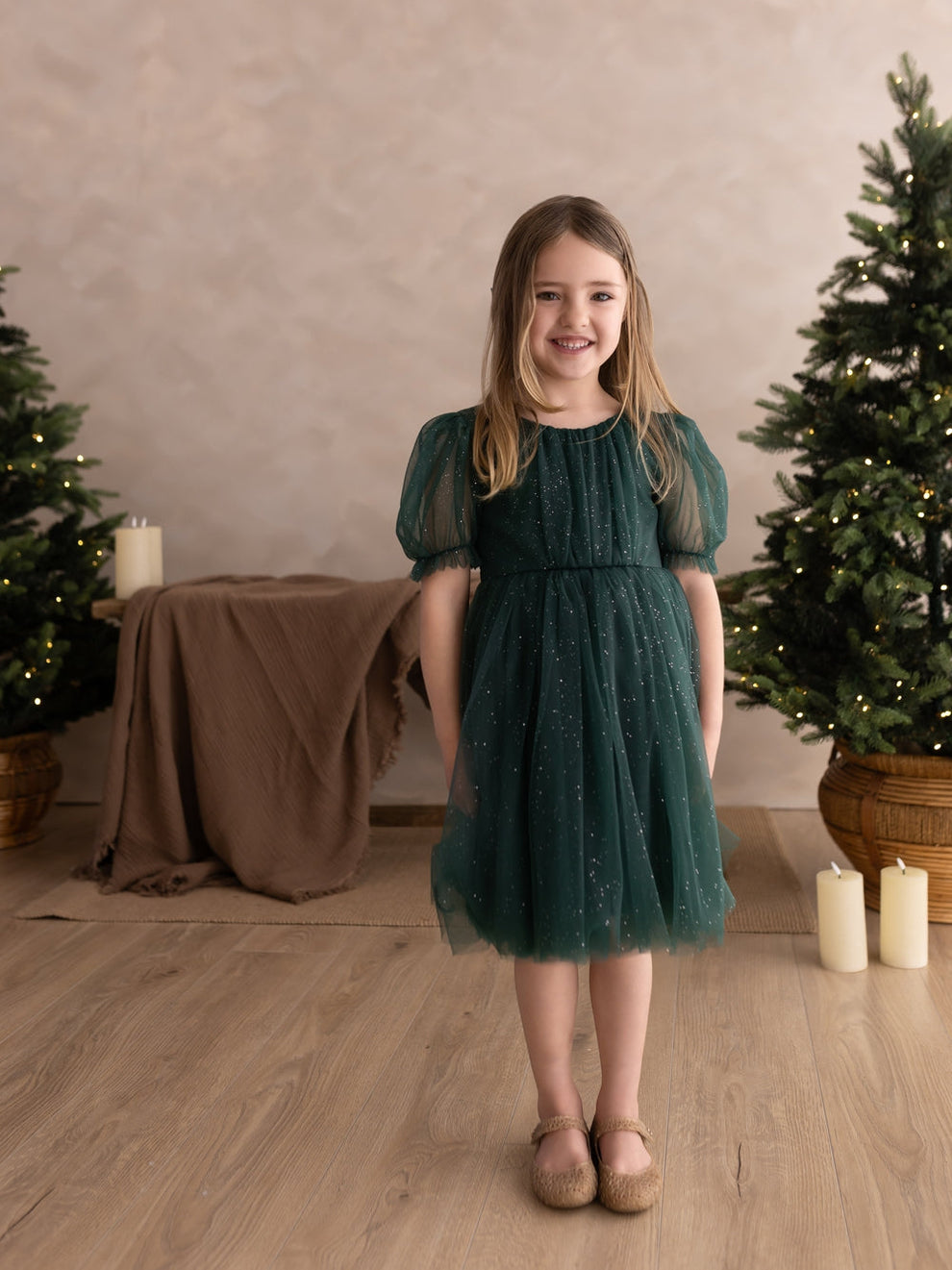 Girls festive green sparkle dress full-length view