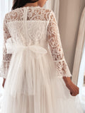 Back view of the Odette dress highlighting the satin bow and zip-up detail.