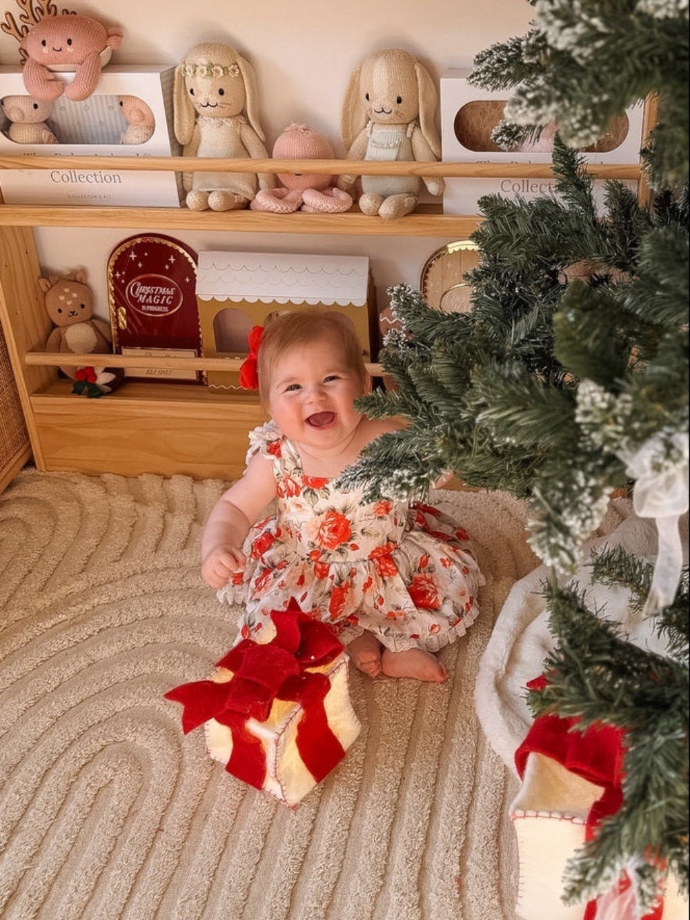 Baby girl holiday romper in festive floral print