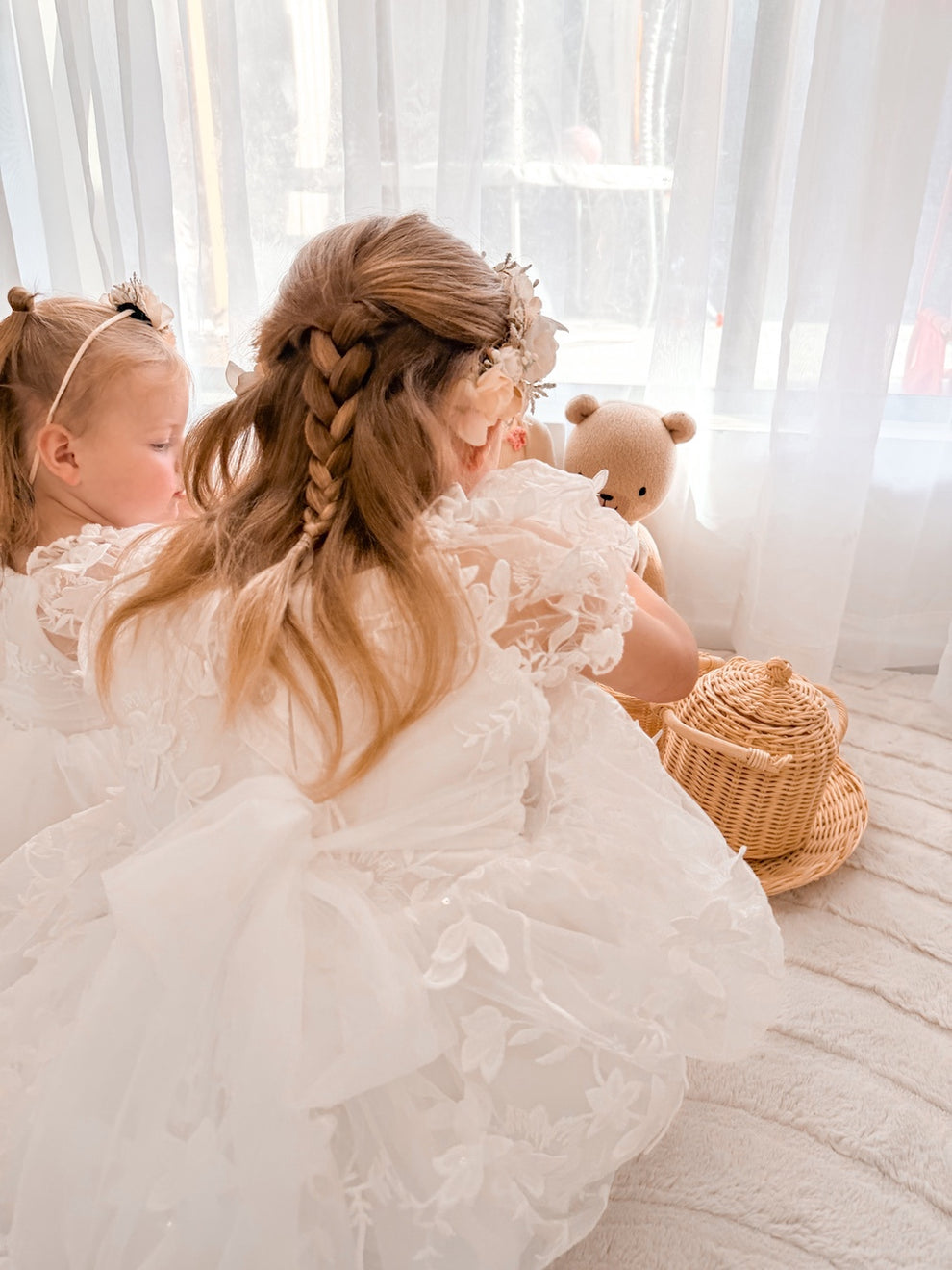 white flower girl dress with embroidered bodice and skirt