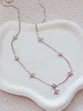 Adjustable girls necklace featuring flowers and diamond accents