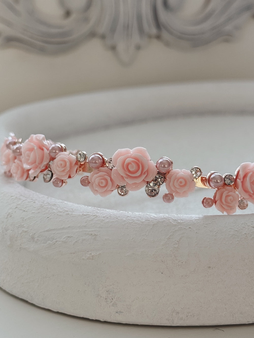 Elegant pink floral headpiece for weddings and special occasions