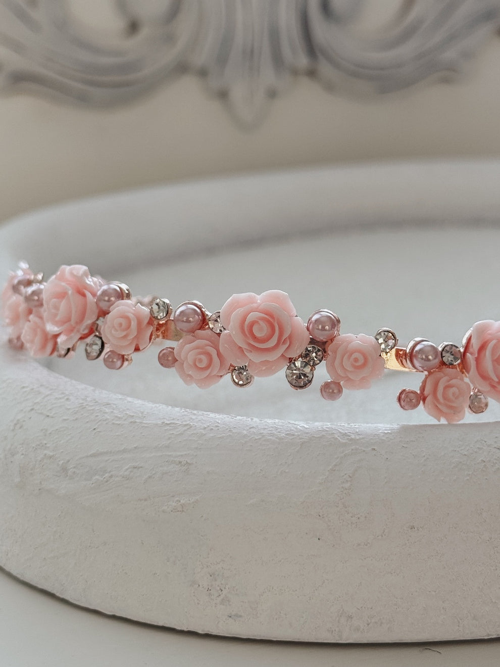 Elegant pink floral headpiece for weddings and special occasions