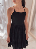 Front view of Phoebe Girls Black Graduation Dress – knee-length chiffon dress with tie-up back