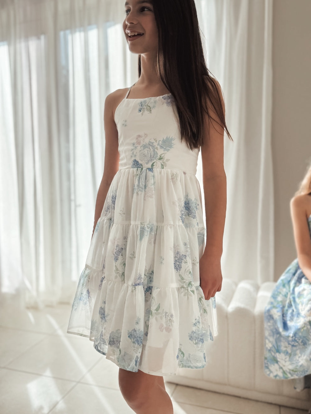 Phoebe Chiffon Girls Dress Blue Floral - Tween Girls DressesDetail shot of tiered chiffon skirt with floral print