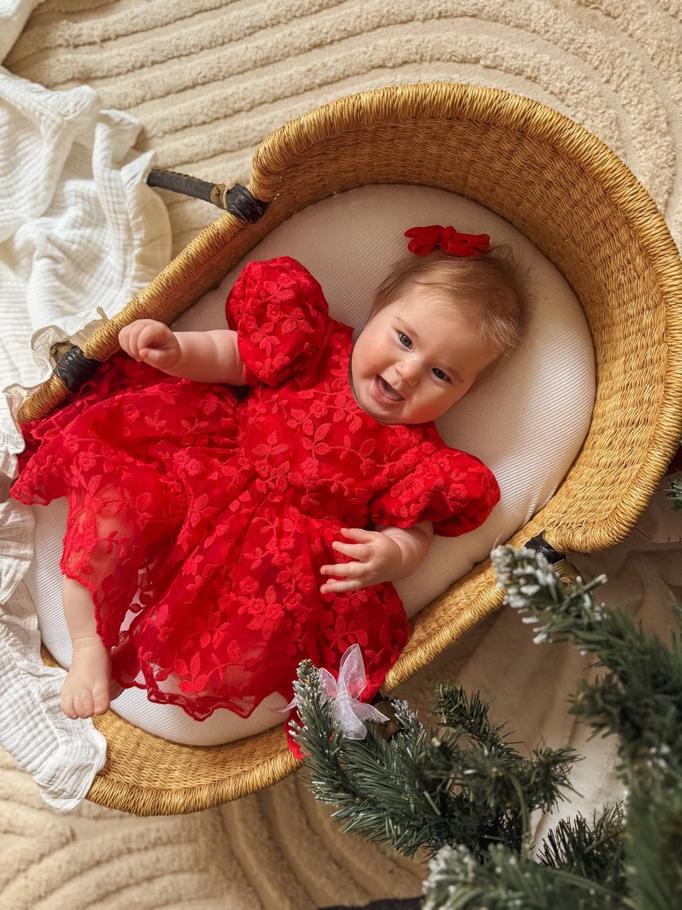 Penelope red baby Christmas dress, floral embroidery close-up
