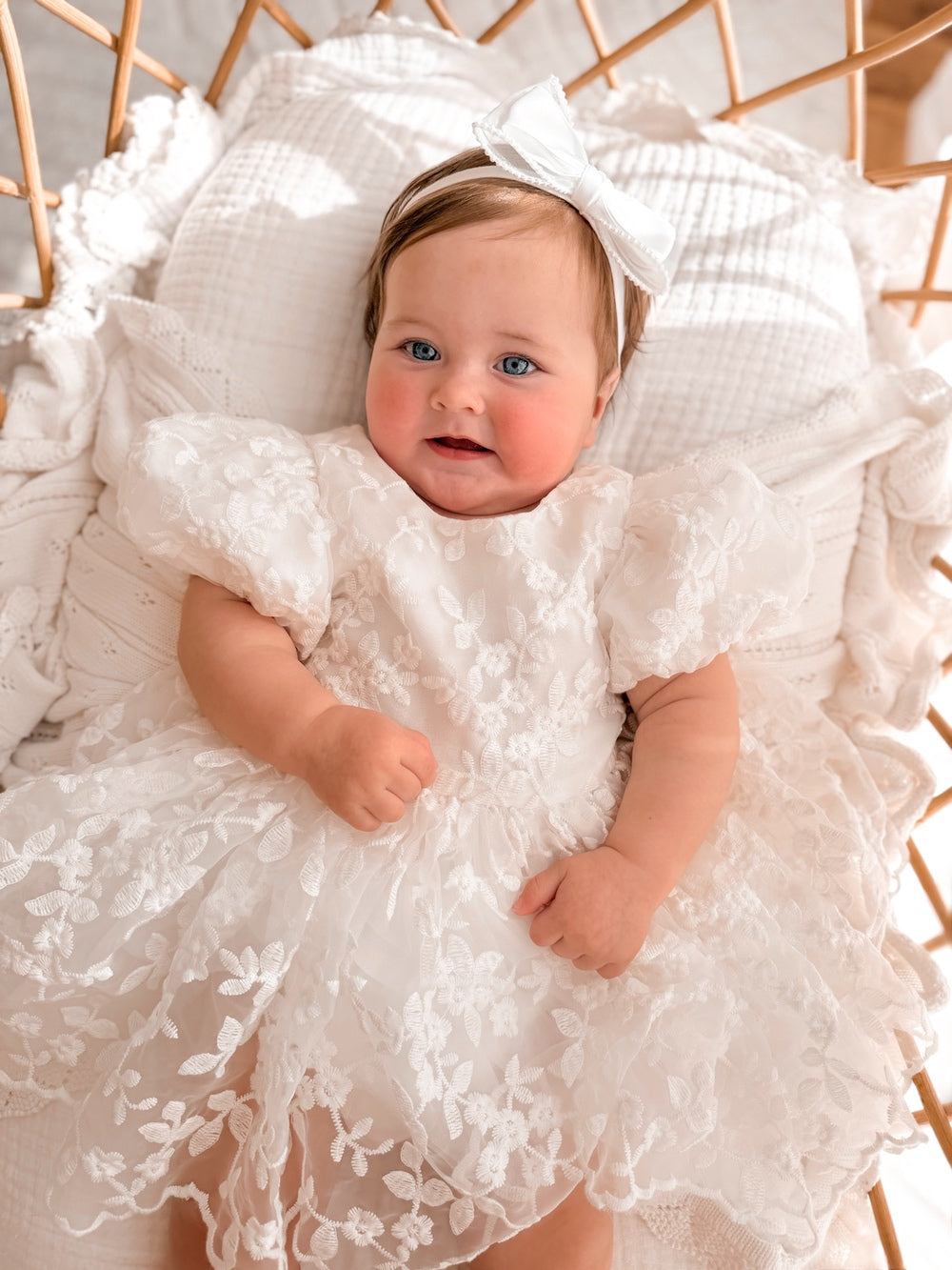 Penelope White Baby Dress with floral embroidery and puff sleeves