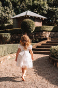 White flower girl dress with delicate petal embroidery
