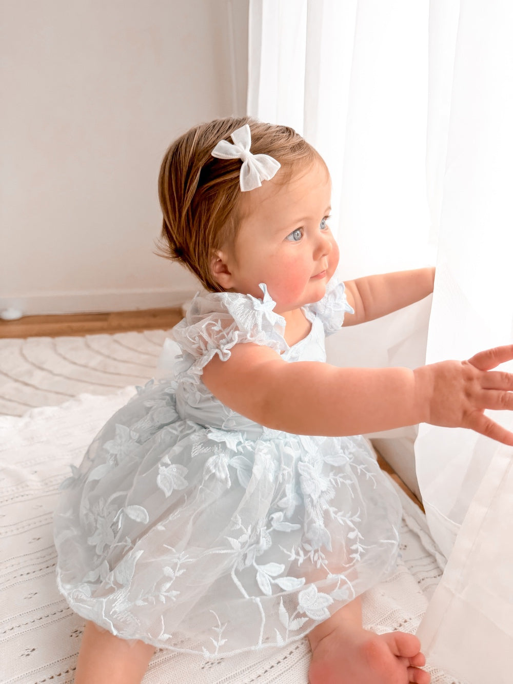 Embroidered baby party dress in pale blue