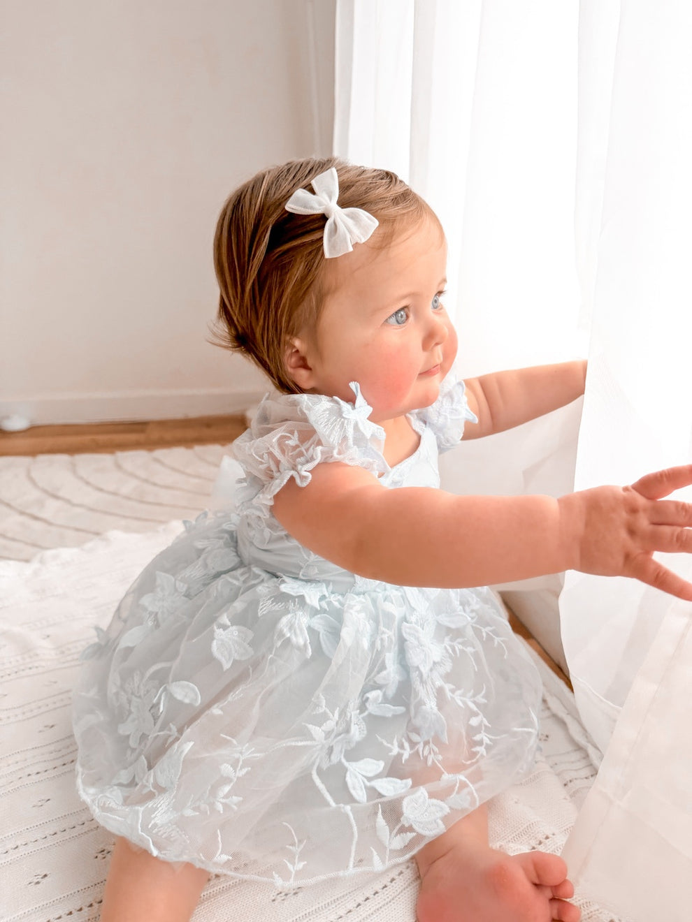 Embroidered baby party dress in pale blue