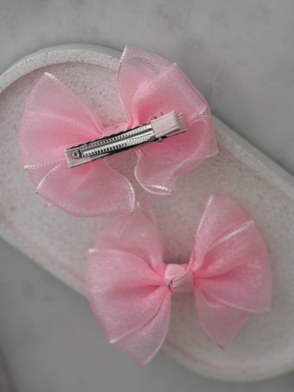 Pink bow hair accessories for flower girls