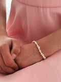 Close-up of sugar plum beaded necklace charm detail