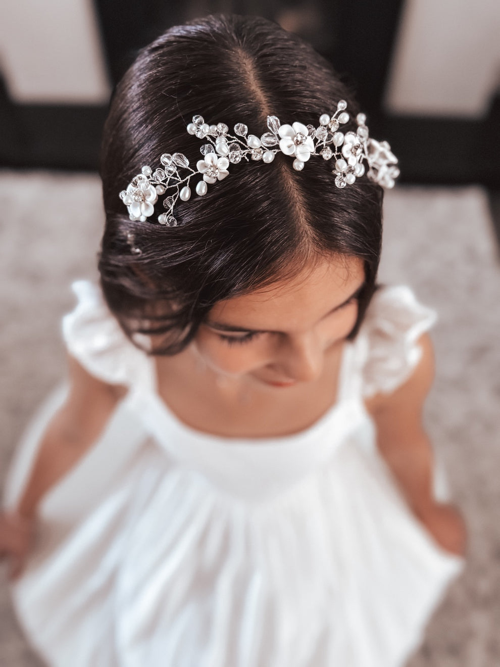 Flower girl wearing Tiana Silver Headpiece – elegant hair accessory for weddings & communions