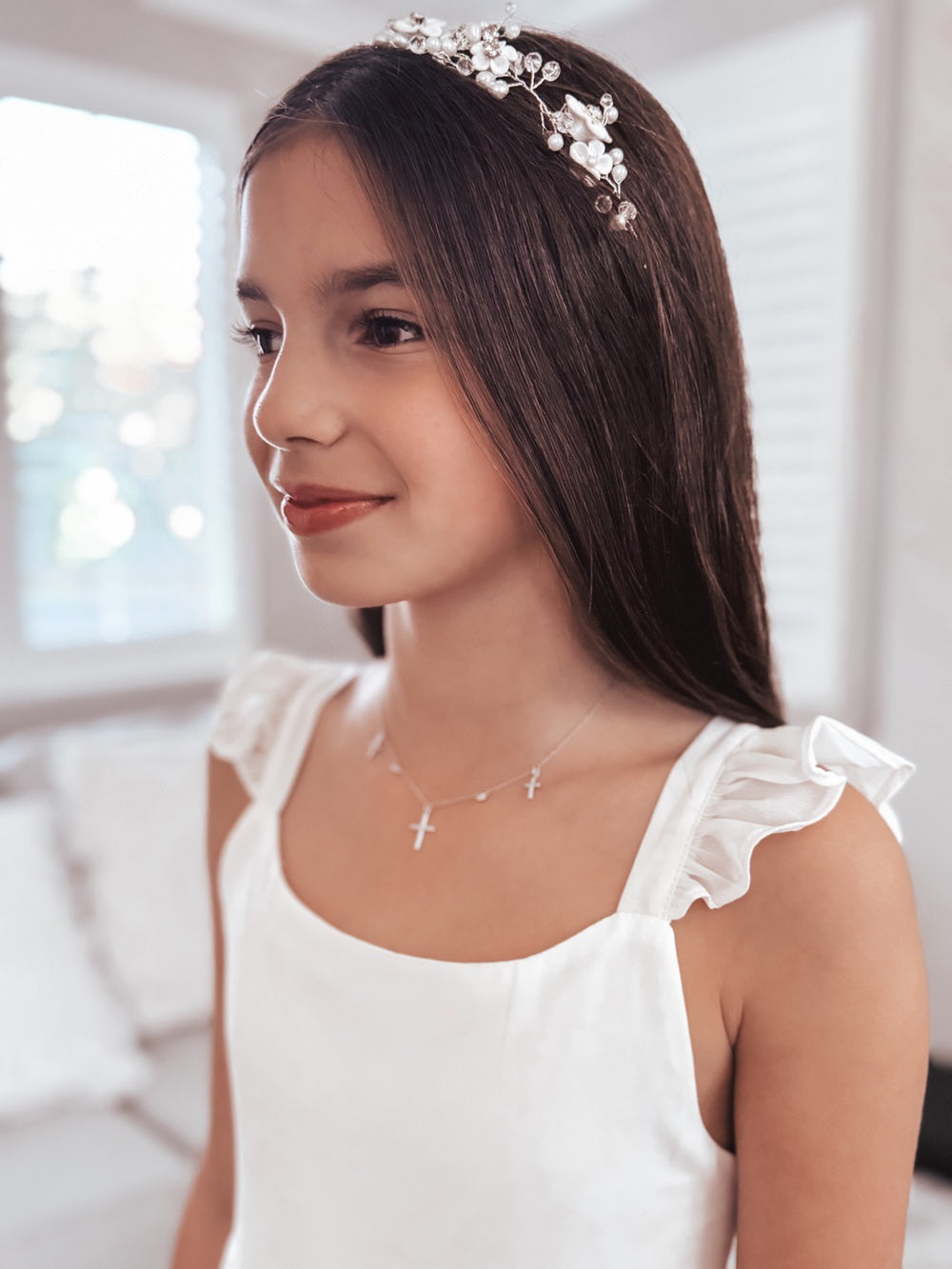 Tiana Girls Silver Headpiece - Tiaras and HeadpiecesClose-up of Tiana Girls Silver Headpiece showing delicate floral, bead, and pearl details