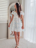 Girls floral wedding guest dress in blue and white