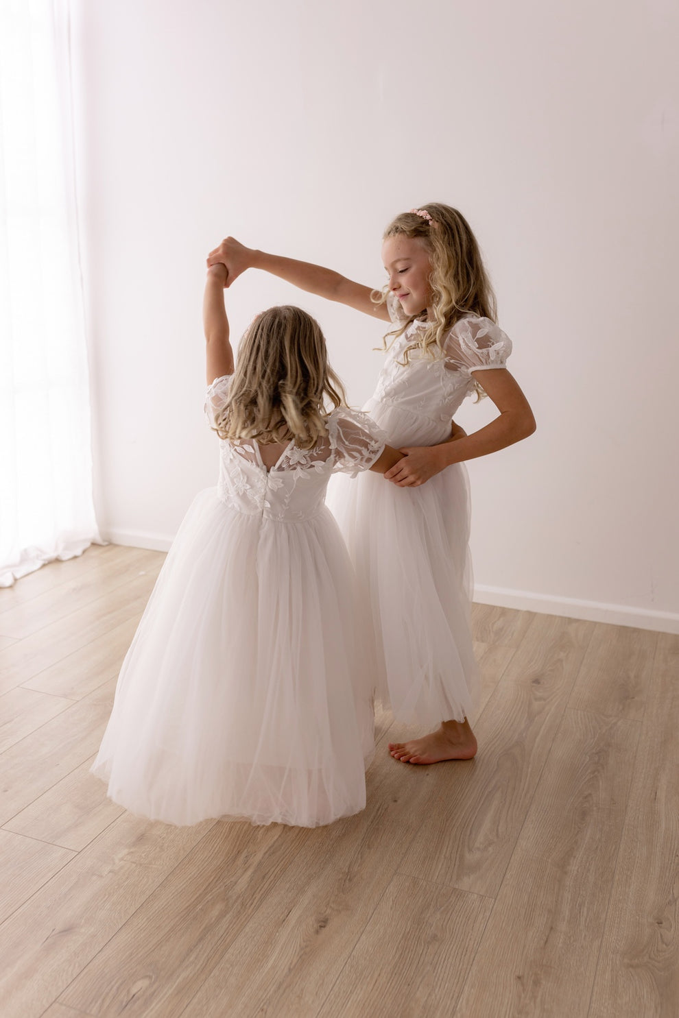 Girls white dress with floral embroidered overlay and soft tulle skirt