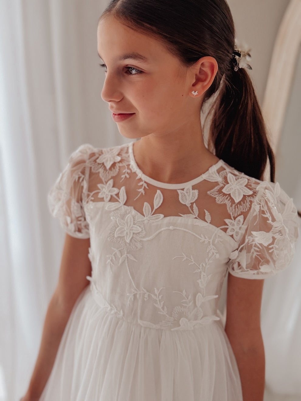 Full length white flower girl dress with embroidered mesh sleeves