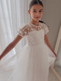 Full length white flower girl dress with embroidered mesh sleeves
