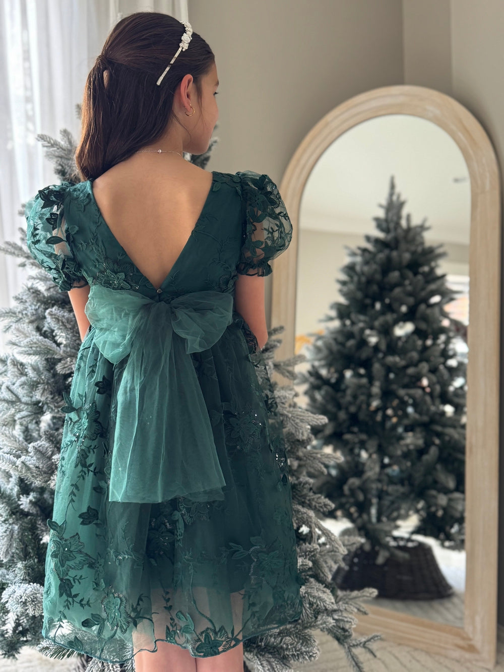 Green girls Christmas dress with oversized tulle bow and V-back