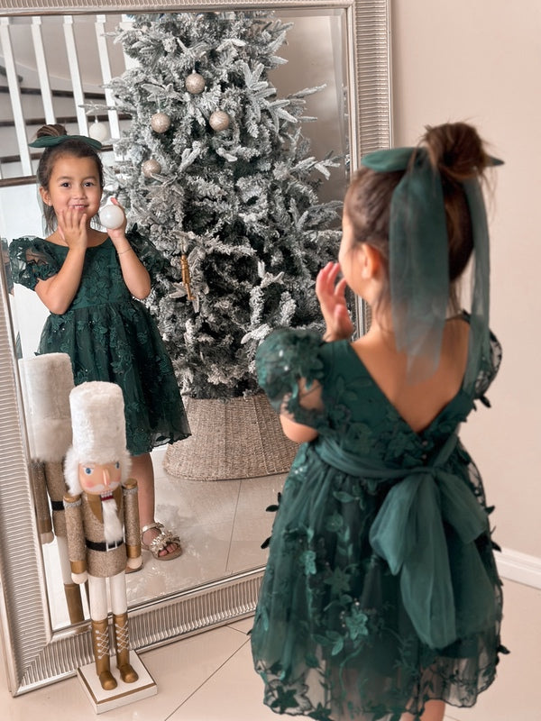 Festive dress for girls with embroidered details and flowing skirt